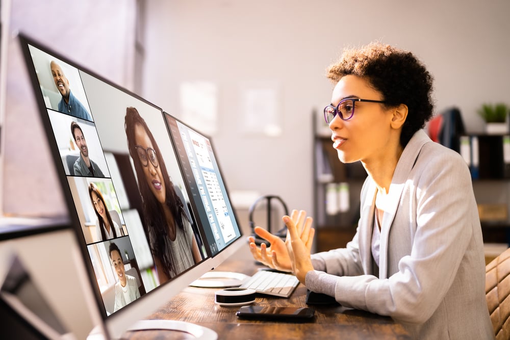 Woman on virtual meeting using AI tools to improve her meeting process